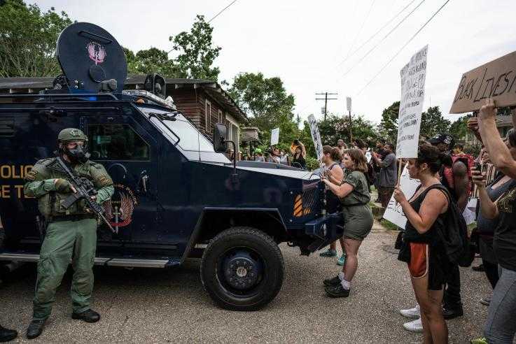 Protesters face down militarised police in the USA
